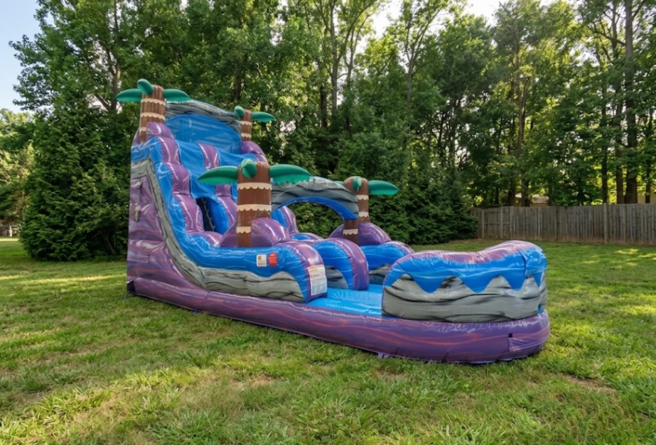 Rent the 18ft Purple Hurricane Water Slide in New Orleans with delivery and setup